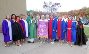 Bishop Dennis Sullivan stands with members of the Catholic Daughters of America, Court Stella Maris 288, Nov. 6 at Our Lady of Perpetual Help Parish in Galloway. The Camden leader celebrated an 11 a.m. Mass for the community, which is marking its 100th anniversary. Photo by James A. McBride