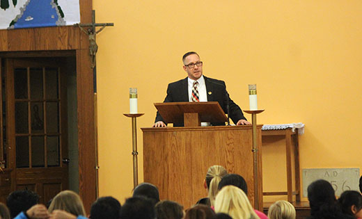 Mark Taylor, director of Veterans’ Services at Catholic Charities, Diocese of Camden, delivers a speech about ways to support the military through spiritual and corporal acts of mercy at Saint Joseph’s Church in Somers Point on Feb. 6. Below, parishioners create Valentine’s Day cards for those serving in the military and veterans.

Photos by Mary McCusker