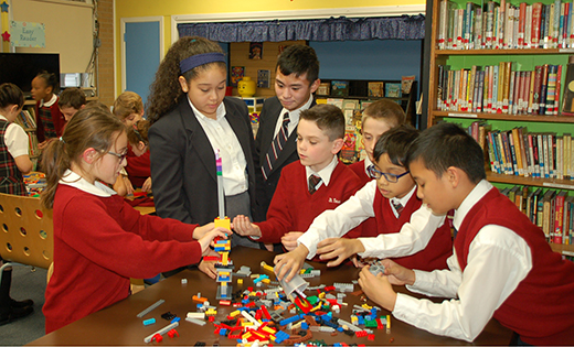 Students from different grades work together after school during a meeting of the Lego club at Saint Teresa School, Runnemede, on Jan. 24.
Photo by James A. McBride