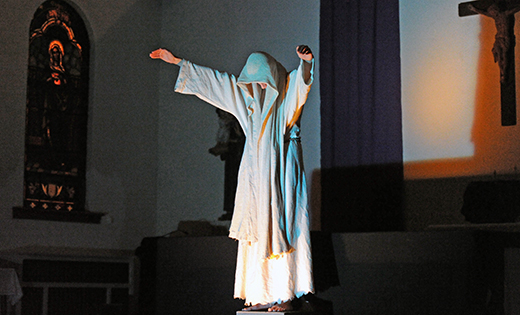 A young person portrays Jesus during a presentation last year of “Jesus the Healer: A Living Meditation on Healing” by the Franciscan Mystery Players. Each presentation is bookended by a prayer circle — the teens first pray together amongst themselves before beginning their performances. Once the meditation is over, they invite members of the audience to join them on the steps of the sanctuary.

Photo by Alan M. Dumoff