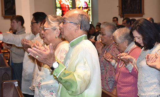 Worshippers pray during a Mass honoring Filipino saints at the Cathedral of the Immaculate Conception, Camden, on April 23. The Inaugural Diocesan Celebration of the Filipino Saints Pedro Calungsod and Lorenzo Ruiz drew 300 people, including members of several area faith and community organizations.

Photo by James A. McBride
