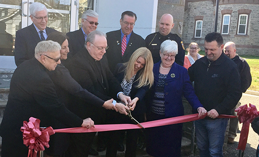 Bishop Dennis Sullivan cuts the ribbon with school and city officials on April 2 to signify the opening of Holy Angels Catholic School, September 2017. The new school is located on the Holy Angels Parish Campus in Woodbury. Holy Trinity School in Westville will relocate to the new Holy Angels location, and new enrollments are welcome for the 2107-18 school year. For more information and to schedule a visit, contact Michelle DiCapua at 856-848-6826.