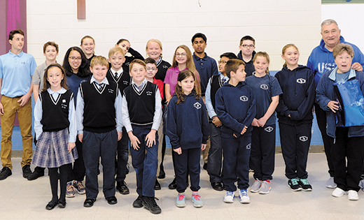 The Student Council of Saint Vincent de Paul Regional School, Mays Landing, presented Frank and Betty Kobelo, the grandparents of one of their fellow classmates who lost their home to a fire in Laureldale on March 22, with a check and gift cards for over $2,000. The students raised the money with a “dress down day” fundraiser.

Photo by Alan M. Dumoff