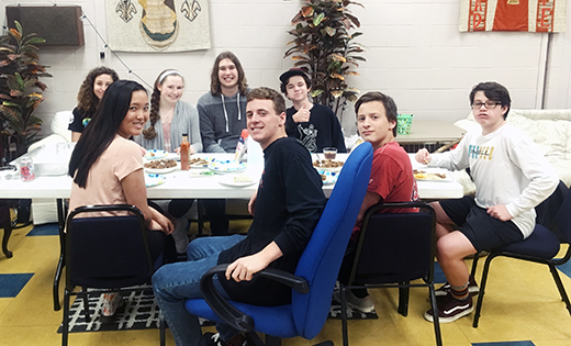 Weekly “Family Dinners” at Saint Damien Parish, Ocean City, are an opportunity for teenagers to discuss both faith and the challenges of daily life.