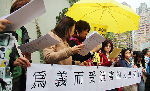 Hong Kong residents hold a banner that reads “Blessed are those who are persecuted for righteousness sake.” The protest was part of a movement initiated as an effort to force the Hong Kong and Chinese governments to allow true democracy in the city.

CNS photo/Francis Wong