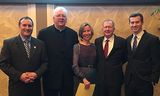 Sylvia Mary McFadden of Saint Joseph School, Somers Point, poses for a photo after being awarded a $1,500 direct teacher grant by the Atlantic City Metropolitan Business & Citizens Association during a luncheon at the Tropicana Hotel and Casino. Standing with her are, from left, Ted Pugliese, principal, Father Ed Namiotka, pastor of Saint Joseph Church, husband Michael McFadden, and son Ryan McFadden.