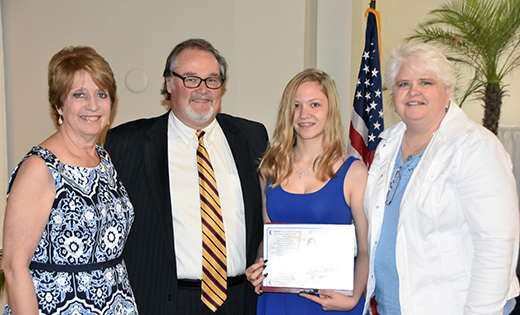 Mary Pearson, this year’s recipient of the Dr. David T. Coghlan Young Catholic Leader award, stands with Kathy Coghlan; Edward Beckett, principal of Gloucester Catholic High School; and Joan Lind, scholarship committee member and donor.
Photo by James A. McBride