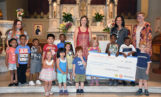 Cheryl Heatwole-Shenk, center, head Montessori teacher at Sacred Heart School, Camden, accepts a check in recognition of efforts to promote lifelong healthy and active lifestyles for Camden’s 3-5 year-olds. Also pictured are Montessori assistants Ivette Torres, (left), and Kristin Schrum, (far right), and Susan Ralston (second from right), who presented the check.
Photo by James A. McBride