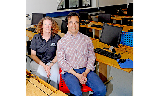 Noël Smith and her husband Eric Wong helped develop a two-year technology program at Wildwood Catholic High School that will begin in September.

Photo by Alan M. Dumoff