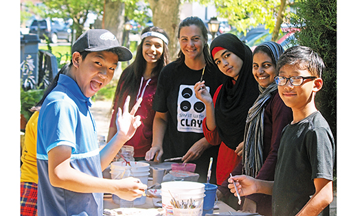 Fourteen refugee teens from Catholic Charities’ Refugee Resettlement Program participate in a twice weekly summer initiative sponsored by Say it With Clay in Collingswood as part of a prelude to Pope Francis’ and Caritas International’s call to “Share the Journey,” a Global Migration Campaign starting this September and lasting until 2019.

Photo by Mary McCusker