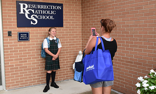 Jessica Scott, fifth grade, gets her photo taken before the school day starts.
Resurrection Catholic has 392 students this year in Prek4-8 grade, an increase of over 40 students from last year.