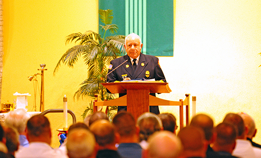 Vineland Fire Chief Donald Fichocci reads the Firefighters’ Prayer at the Blue Mass on Sept. 10 at Saint Anthony of Padua Church, Saint Mary of Mount Carmel Parish, Hammonton. The annual diocesan Blue Mass will be held Friday, Sept. 29, 10 a.m., at Saint Agnes Church, Our Lady of Hope Parish, Blackwood.

Photo by Alan M. Dumoff