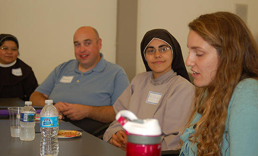 Gabi Marigliano, right, introduces herself to, among others, Sister Pepita Ontong, FMIJ; Greg Coogan, Diocesan Director of Young Adult Ministry; and Sister Chiara Rose Fedele, CFR during last Sunday’s inaugural meeting of the Samuel Group at Saint Thomas More Parish in Cherry Hill. For the next seven months, young adults will gather with Coogan and faith leaders to discern their role in the church and world.

Photo by Peter G. Sánchez