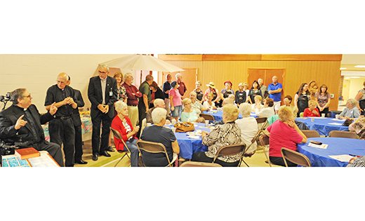 Clergy talk at the opening of The Renaissance Center at Saint Andrew’s. The Gibbsboro parish is the second in the Diocese of Camden to have a senior social day center.

Photos by Alan M. Dumoff