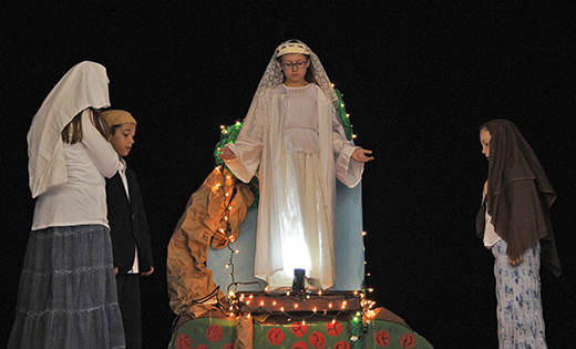 Children of Saint Joseph Regional School, Hammonton, recreate the scene of Mary appearing to three shepherd children at Fatima in 1917.
Photo by Alan M. Dumoff