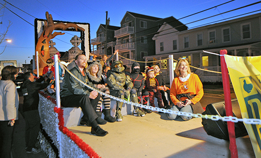 Principal Thomas McGuire, advancement director Felicia Niven and schoolchildren ride the Bishop McHugh Regional School float in the Sea Isle Halloween Parade on Oct. 20. The float’s theme was “Bishop McHugh’s Not So Scary Halloween!”

Photo by Alan M. Dumoff