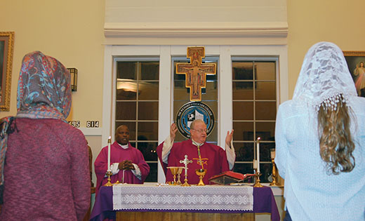 Bishop Dennis Sullivan, with Father Vincent Okoro, celebrates Mass March 4 for students of Stockton University’s Catholic Campus Ministry in Galloway Township.
Photo by Peter G. Sánchez