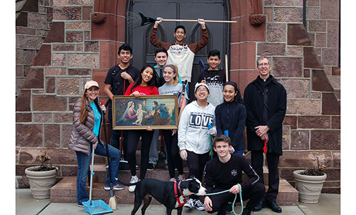 Last month, youth from Hammonton’s Saint Mary of Mount Carmel Parish, led by Youth Minister Kimberly Pesotski, spent a day of service at the Cathedral of the Immaculate Conception, Camden, cleaning the grounds and celebrating Mass with Father Michael McCue. Pictured are Pesotski, at far left, with youth, and Father McCue and his four-legged best friend, Skye.
Photo by Peter G. Sánchez
