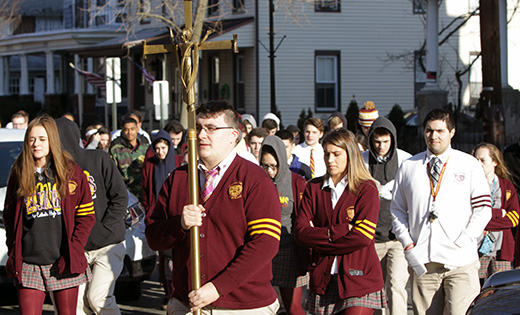 Gloucester Catholic students walk in procession from their school to Saint Mary Church for a prayer service on March 14 during the National School Walkout, a student-led response to the Feb. 14 school shooting in Parkland, Florida. At the South Jersey Catholic secondary schools, the day took on a prayerful tone. 

Photo by Mike Walsh