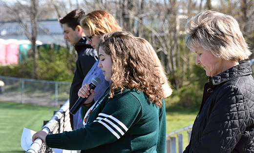 — Students of Camden Catholic High School, Cherry Hill, held an outdoor service April 20 commemorating the 19th anniversary of the mass shooting at Columbine High School and remembering victims of the recent Stoneman Douglas violence in Parkland, Florida. Seniors Emma Daverso and Emily Deveraux led students in prayer. Faculty member Jeff Bruckner encouraged students to act with kindness as Jesus would and to become educated about issues affecting their generation. The voluntary service was a prayerful alternative to the national student walkout planned for that day. Pictured at far right is school president Mary Whipkey. Second from left is the principal, Heather Crisci.
Photo by James A. McBride