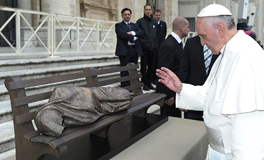 CNS photo/L’Osservatore Romano

Pope Francis blesses the sculpture “Jesus the Homeless” by Canadian Timothy Schmalz during his general audience in Saint Peter’s Square at the Vatican in this 2013 file photo.