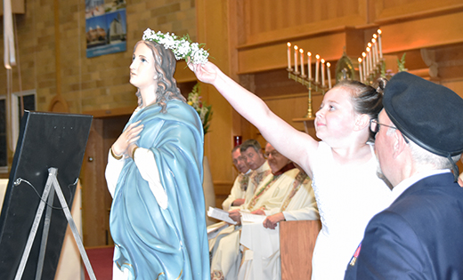 The Knights of Columbus’ New Jersey State Council’s opening Mass for their annual state convention on May 18 included a May Crowning. Below, Bishop Sullivan talks to students of Cape Trinity Catholic Regional School.