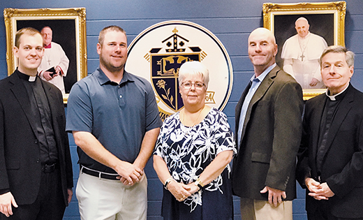 — Holy Spirit High School, Absecon, welcomes Father Joshua Nevitt, far left, as Director of Catholic Identity. Other changes for the upcoming academic year include Jason Downey, second from left, head coach of the Holy Spirit High School baseball team, taking over as Director of Enrollment Management, and Mark Reardon, a 1989 Holy Spirit High School alumnus, taking over as Director of Institutional Advancement. Pictured with the new additions to the school’s leadership team are Father Perry Cherubini, president of Holy Spirit High School, and principal Susan Dennen.