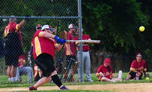 A Saint Charles hitter connects with the ball in the Sicklerville teams’ June 25 game against Holy Family, Sewell. The Diocese of Camden’s co-ed Softball League is coming to the end of its season.

Photo by Alan M. Dumoff