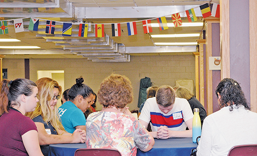 Multicultural dinner — 

People pray at the multicultural pot luck dinner Aug. 9 at the Catholic Community of Christ Our Light Parish, Cherry Hill. The event was sponsored by the parish and the Marianist Social Justice Collaborative.


Photo by Alan M. Dumoff