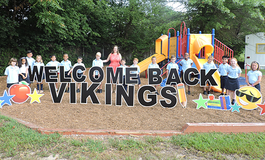 Catholic schools in the Diocese of Camden opened their doors and welcomed students for the 2018-19 school year on Sept. 5. 
Second graders stand behind the welcome sign that the Home & School Association provided the children for the first day of the new school year at Saint Vincent de Paul Regional School, Mays Landing.