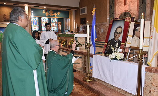 Photo by James A. McBride

Father Vincent Guest, pastor, blesses an image of Saint Oscar Romero at a Mass celebrating his canonization on Oct. 14 at Our Lady of Guadalupe Parish, Lindenwold. Also pictured is Deacon Omar M. Aguilar of Saint Joseph Pro-Cathedral, Camden.