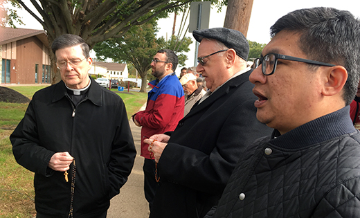 During the 40 Days for Life campaign last month, Bishop Dennis Sullivan led pro-life supporters in praying the rosary outside a local abortion clinic, the Cherry Hill Women’s Center. His visit concluded with all praying for an end to abortion. With Bishop Sullivan, above, are Father George Seiter, pastor of Holy Eucharist Parish in Cherry Hill; Michael Jordan Laskey, former diocesan director of Life and Justice; and Father Philip Ramos, parochial vicar at Christ Our Light Parish in Cherry Hill. Below, Kari Janisse, youth minister at Our Lady of Peace Parish in Williamstown, prays with supporters and her son, John Paul.

Photos by Peter G. Sánchez