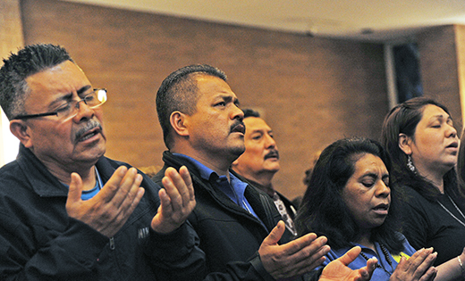 Worshippers pray during the Diocesan Hispanic Celebration Dec. 2 at Divine Mercy Parish, Vineland.

Photo by Alan M. Dumoff