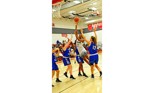 — Wildwood Catholic High School defeated Holy Spirit (Absecon) 47-33 on Jan. 27. Above, the Spartan’s Zhyana Young stretches for the rim.

Photo by Alan M. Dumoff