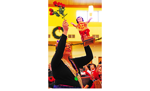 Filipino Catholics from across South Jersey gathered at Blackwood’s Saint Agnes Church, Our Lady of Hope Parish on Sunday, Jan. 13 for the feast of the Santo Nino de Cebu, the Infant Jesus. In 1521, tradition holds that a statue of the Santo Nino was given to Queen Juana of Cebu as a baptismal gift by explorer Ferdinand Magellan as a sign of the queen’s entrance into the Catholic faith and her people’s alliance with Spain. Above, a joyful witness holds up a statue of the child Jesus. Below, Father Joseph Szolack, pastor, with Deacon Andy Encarnado, blesses the Santo Nino statues in front of the altar.


Photos by Alan M. Dumoff
