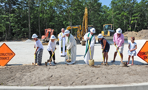 Photo by Alan M. Dumoff
Bishop Dennis Sullivan, Msgr. Peter Joyce, pastor, and others participate in the groundbreaking ceremony for a new parish/community center at Saint Maximilian Kolbe Parish, Marmora, on July 14.