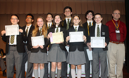 Teacher John Rotondi stands with students of Saint Peter School, Merchantville, who were recognized for their high marks on the National Latin Exam.