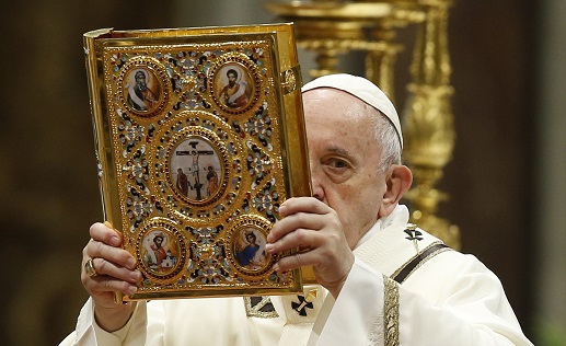 Pope Francis holds the Book of the Gospels as he celebrates Mass marking the feast of the Epiphany in St. Peter's Basilica at the Vatican Jan. 6, 2020. The pope has established the third Sunday in Ordinary Time as "Sunday of the Word of God." It will be celebrated for the first time Jan. 26.(CNS photo/Paul Haring) See SUNDAY-WORD-GOD Jan. 9, 2020.