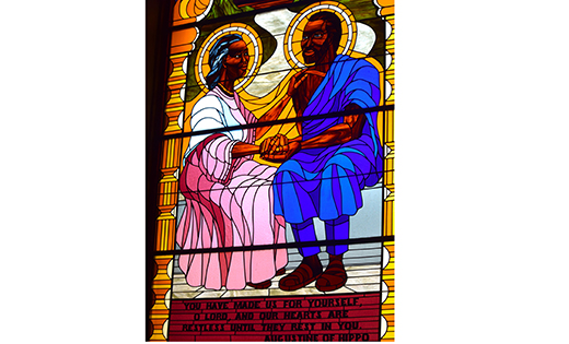 This stained-glass window depicting St. Augustine and his mother, St. Monica, graces the wall at St. Augustine Church in Washington July 25, 2019.

(CNS photo/Elizabeth Bachmann)