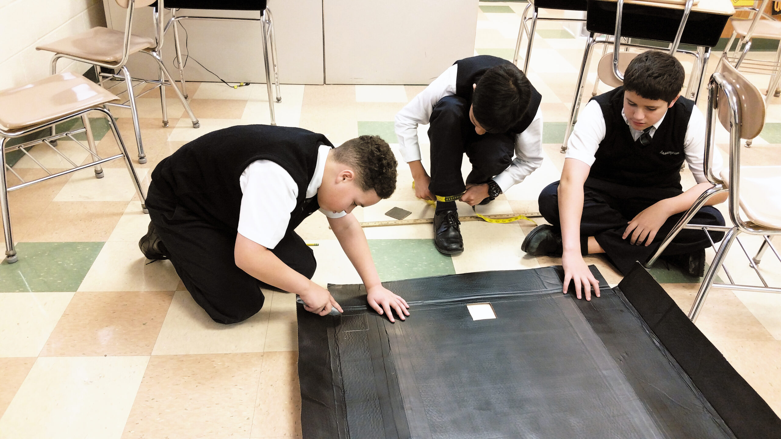 Team Solar Squad members of Assumption Regional School, Galloway, are pictured working on their own design for a solar heater. The team won first place in the State of New Jersey and were regional finalists in this year’s ECYBERMISSION competition, a web-based science, technology, engineering and mathematics (STEM) competition for students in grades six through nine.  Inspired by the field of solar panels that are producing electricity for their school, Team Solar Squad decided to investigate if a solar heater could be used to heat a room. The team researched, designed, built and tested two different types of solar heaters. Each member will be awarded a $1,000 savings bond for their first place win in New Jersey and an additional $1,000 saving bond for being finalists in the regional competition, which represented the area from Maine to Virginia. Science teacher Patricia Naples shepherded the team in their work.