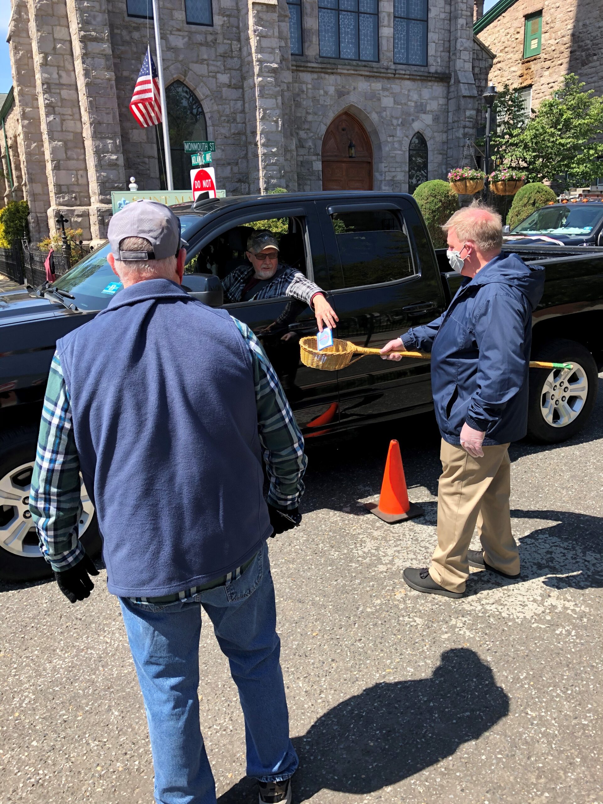 Each Sunday, several members of the Knights of Columbus, Gloucester City Council 674, take up the weekly collection in front of Saint Mary Church.  Parishioners drop their weekly offering into the collection basket safely, from their own car. Knights wear masks and gloves and take precautions to protect themselves and the parishioners.  Parishioners were made aware of the effort through the parish Facebook page, website and pulpit announcements during the live-stream Mass.