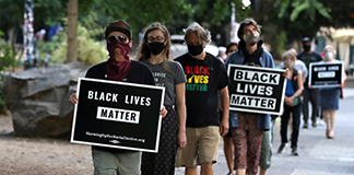 People in Portland walk near the Justice Center to support of Black Lives Matter Sept. 1, 2020. (CNS photo/Caitlin Ochs, Reuters)