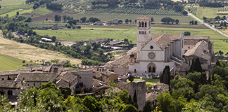 The Basilica of St. Francis of Assisi is seen from the Rocca Maggiore, a fortress on top of the hill above the town of Assisi, Italy, in this May 28, 2013, file photo. Pope Francis plans to visit Assisi on Oct. 3 to celebrate a private Mass and sign his new encyclical on human fraternity. (CNS photo/Octavio Duran)