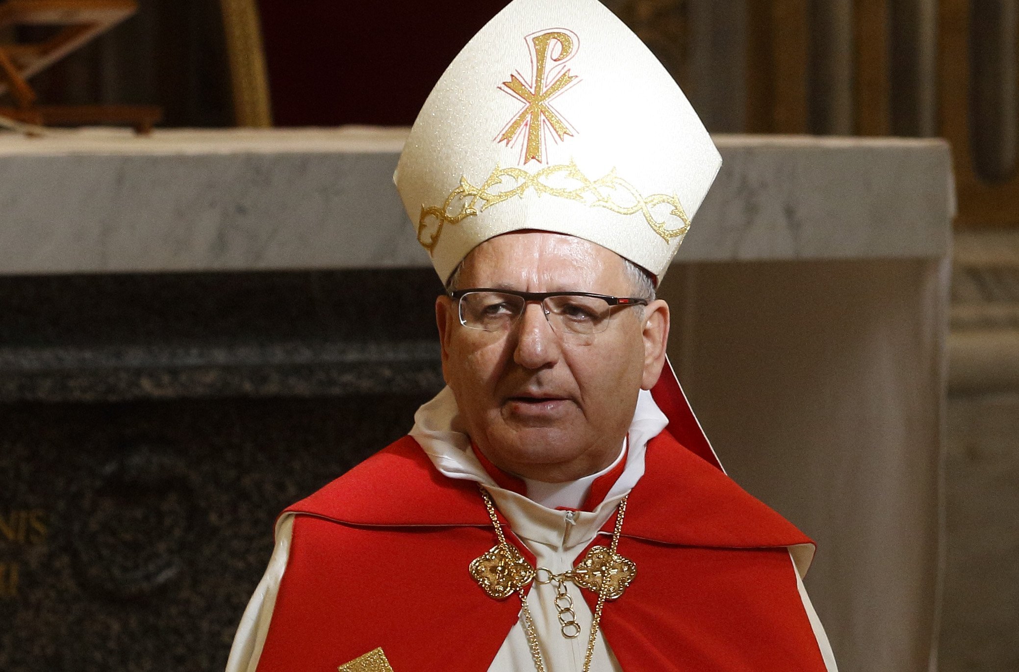 Chaldean Patriarch Louis Sako of Baghdad celebrates a liturgy in St. Peter's Basilica at the Vatican in this Feb. 4, 2013, file photo. Cardinal Sako said the church in Iraq is working with the government to prepare for Pope Francis' planned March 5-8 visit to Iraq. (CNS photo/Paul Haring)