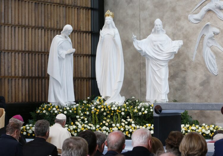 Pope Francis is pictured in an Aug. 26, 2018, photo praying as he visits the Chapel of the Apparitions at Ireland's Knock Shrine. Pope Francis delivered a special virtual message recognizing the shrine as an International Marian and Eucharistic Shrine during Mass March 19, 2021. (CNS photo/Paul Haring)
