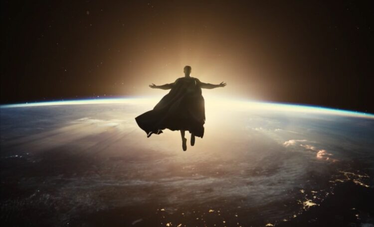 Superman, played by Henry Cavill, soars above the Earth in a scene from the movie, "Justice League," by director Zack Snyder. Bishop Paul Tighe, secretary of the Pontifical Council for Culture, told Catholic News Service that Snyder's use of religious imagery in his film series attracts attention to Christ's passion because "the humanity of Christ is so clear." (CNS photo)