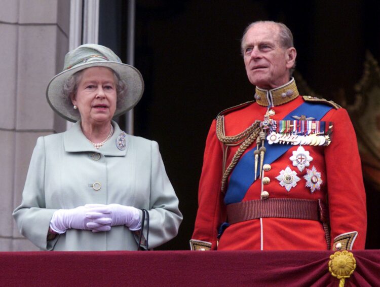 Britain's Queen Elizabeth II and Prince Philip, Duke of Edinburgh, are pictured standing on the balcony of London's Buckingham Palace June 16, 2001. Prince Philip, the longest-serving consort of any British monarch, died April 9, 2021, at age 99, Buckingham Palace said. (CNS photo/Stephen Hird, Reuters)
