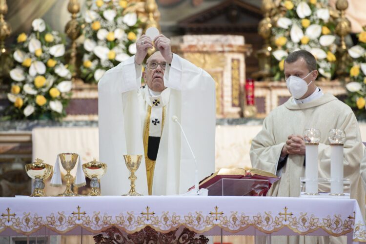 Pope Francis elevates the Eucharist as he celebrates Mass for Divine Mercy Sunday at the Church of the Holy Spirit near the Vatican in Rome April 11, 2021. (CNS photo/Vatican Media)