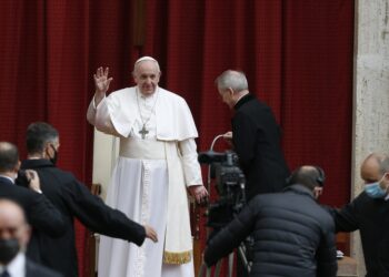 Pope Francis greets the crowd at the start of his general audience in in the San Damaso Courtyard of the Apostolic Palace at the Vatican May 19, 2021. (CNS photo/Paul Haring)