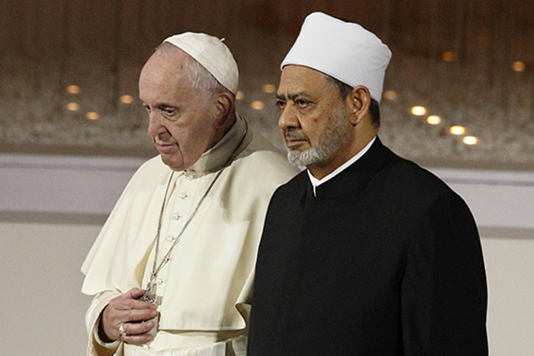 Pope Francis and Sheik Ahmad el-Tayeb, grand imam of Egypt's al-Azhar mosque and university, leave an interreligious meeting at the Founder's Memorial in Abu Dhabi, United Arab Emirates, Feb. 4, 2019. The pope and Sheik el-Tayeb stepped into a theological debate on the will of God toward religions when they signed a document on "human fraternity" and improving Christian-Muslim relations. (CNS photo/Paul Haring) See VATICAN-LETTER-DIALOGUE Feb. 7, 2019.